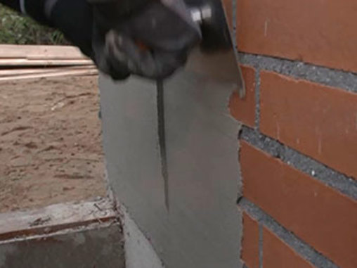 Vandskuring af murstensvæg