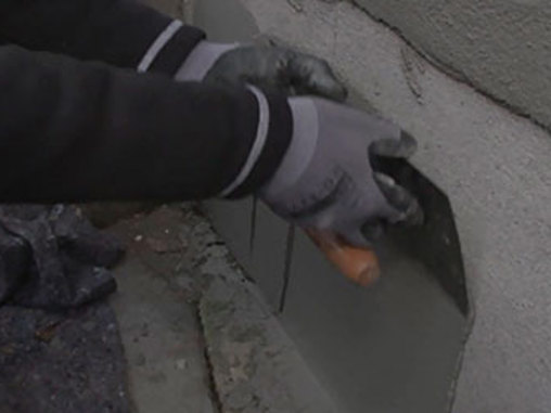 Vandskuring af sokkel